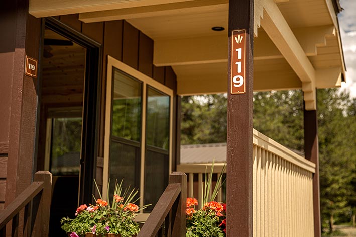 A wooden cabin and porch