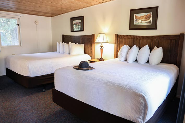 Motel Room at Motel Lake McDonald with two queen beds and small desk